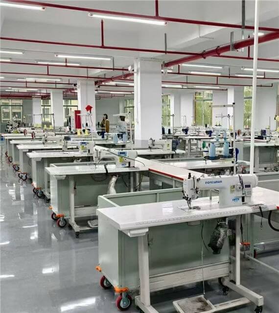 Clean Production Line with Industrial Sewing Machines at Fmosbag Custom Bike Bag Factory in China - Fmosbag - Oem Bag Manufacturer & Custom Bag Factory - Fmosbag - Oem Bag Manufacturer & Custom Bag Factory