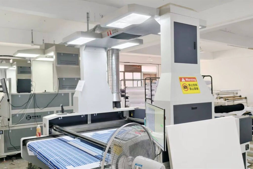 Automatic Fabric Cutting Machine - Oem Bag Factory - Fmosbag - Oem Bag Manufacturer & Custom Bag Factory - Fmosbag - Oem Bag Manufacturer & Custom Bag Factory Automatic Fabric Cutting Machine Cutting 900d Oxford and 1680d Nylon - Fmosbag - Oem Bag Manufacturer & Custom Bag Factory - Fmosbag - Oem Bag Manufacturer & Custom Bag Factory