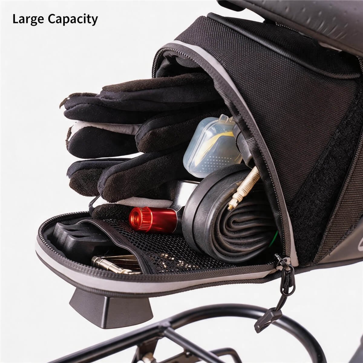 Large Capacity Open Wedge Seat Pack - Fmosbag - Oem Bag Manufacturer & Custom Bag Factory Large Capacity Wedge Seat Pack Open, Packed with Black Gloves, Clear Plastic Case, Rolled Inner Tube, Red Co2 Cartridge, Tire Levers, Multi-tool, Reflective Strip - Fmosbag - Oem Bag Manufacturer & Custom Bag Factory